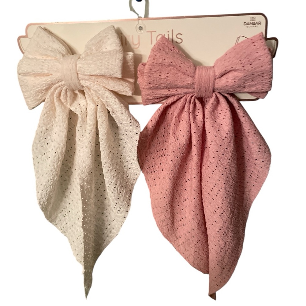 Elegant Pink and Cream Hair Accessories Set. Bows attached to hair clips.